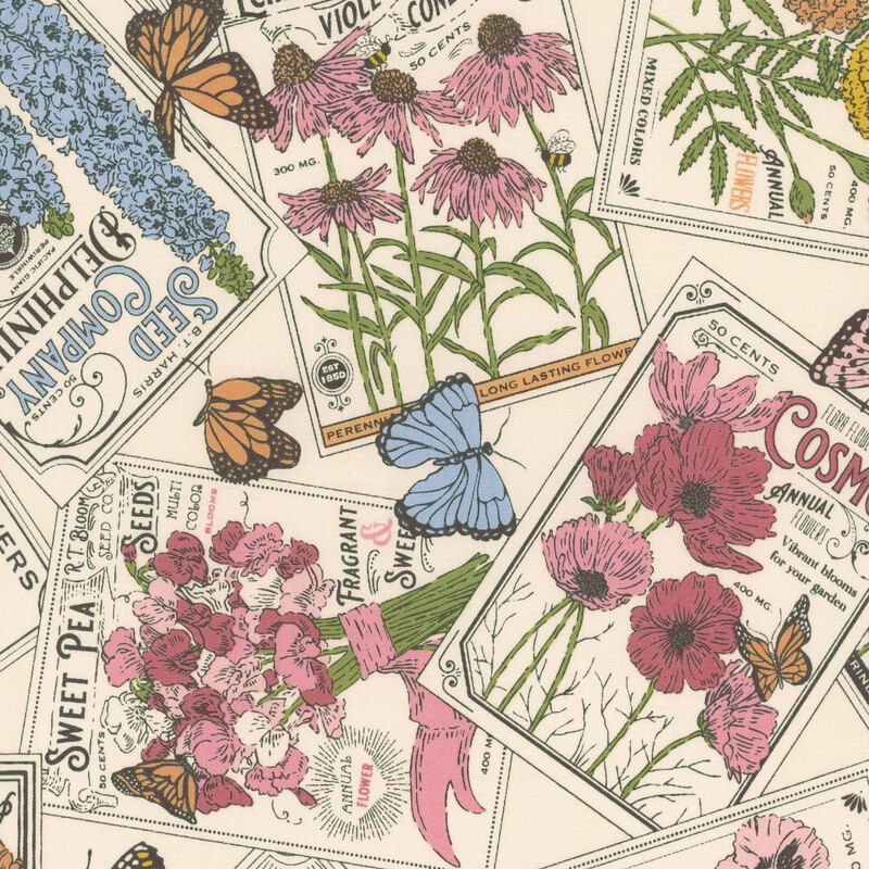 Vintage seed packets of common flowers and butterflies on cream fabric.