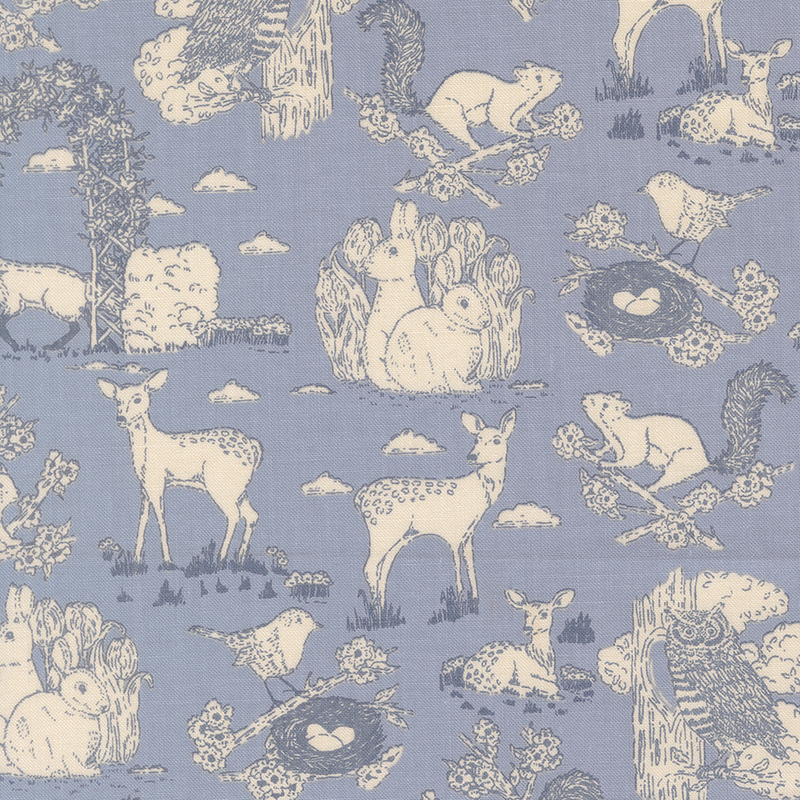 Blue toile fabric featuring garden animals and birds.
