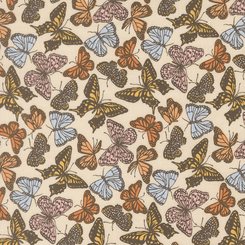 Butterflies of various colors and sizes on cream fabric.