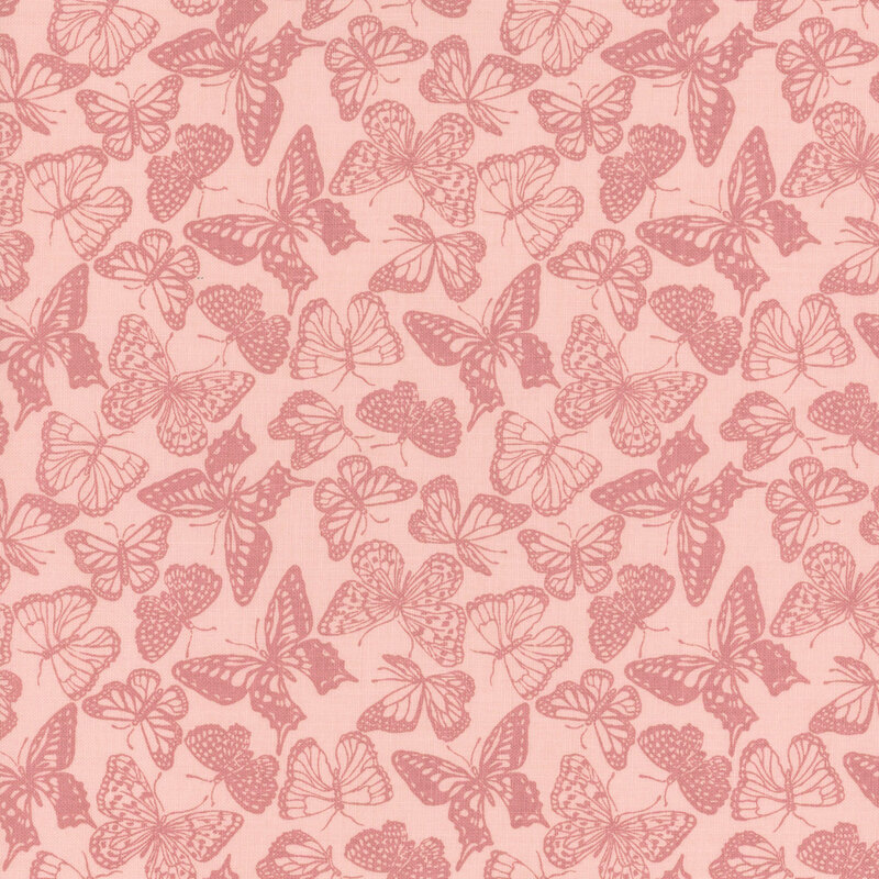 Tonal butterfly silhouettes in various sizes on pink fabric.