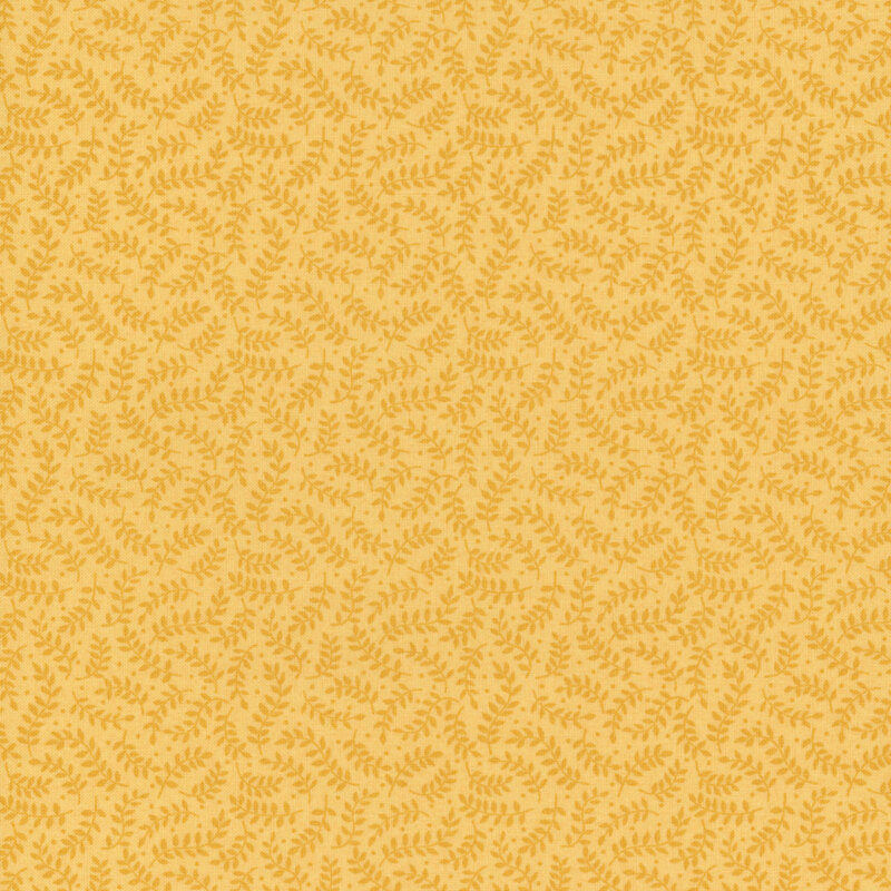 Tonal leafy vines on yellow fabric.
