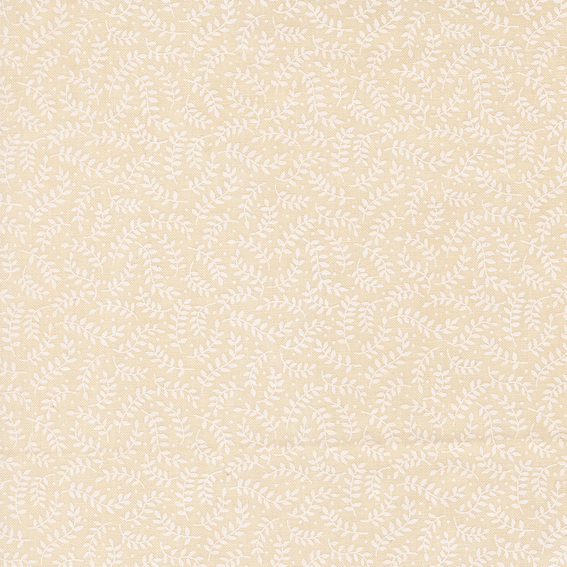 White leafy vines on cream fabric.