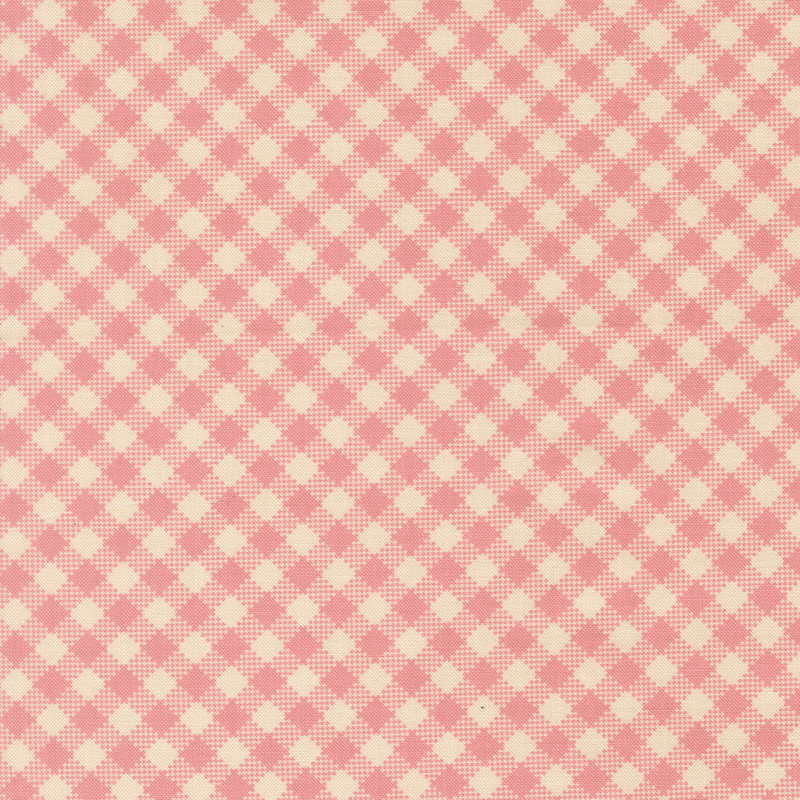 Pink gingham on cream fabric.