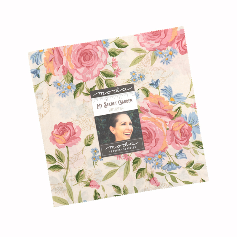 A square bundle of cream, pink, yellow, green, and blue garden themed fabrics, labeled My Secret Garden from Moda Fabrics.