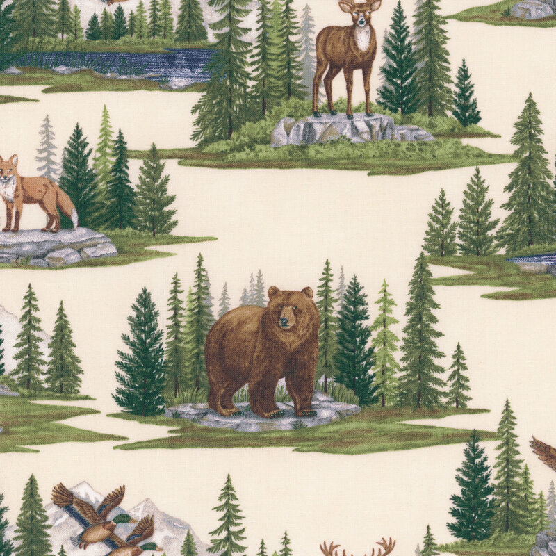 Buff yellow fabric with alpine mountain scenes depicting various woodland creatures within pine forests.
