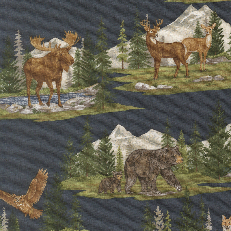 Navy blue fabric with alpine mountain scenes depicting various woodland creatures within pine forests.