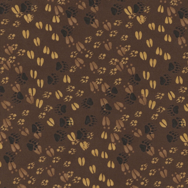 Dark brown fabric with a pattern of various forest animal tracks. 