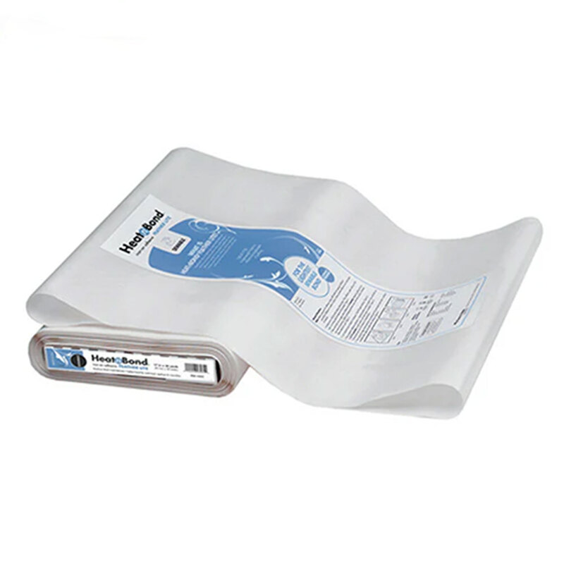 A roll of Heat-Bond adhesive fabric with packaging displaying usage instructions.