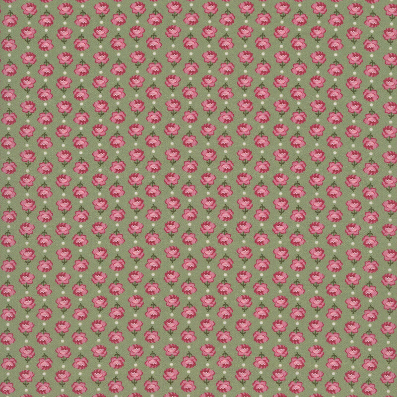 Vertical columns of roses alternating in direction on green fabric.