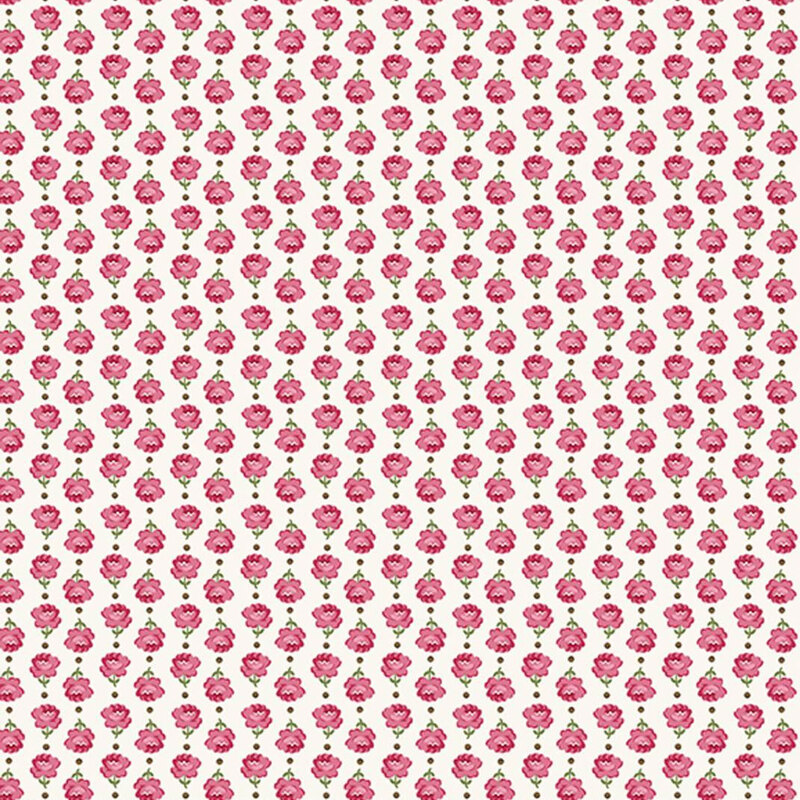 Vertical columns of roses alternating in direction on white fabric.