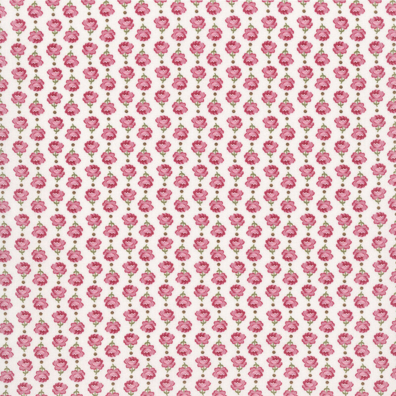Vertical columns of roses alternating in direction on white fabric.