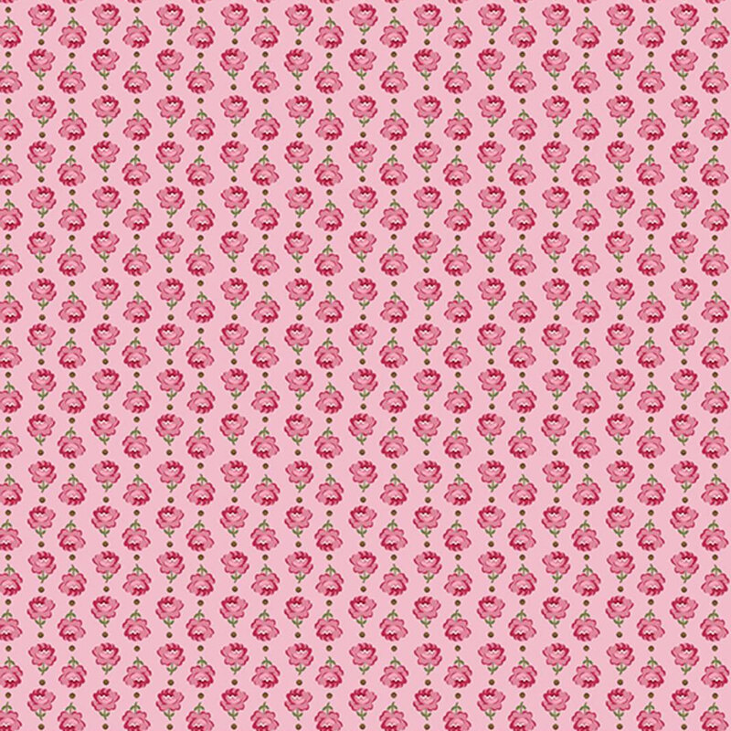Vertical columns of roses alternating in direction on pink fabric.