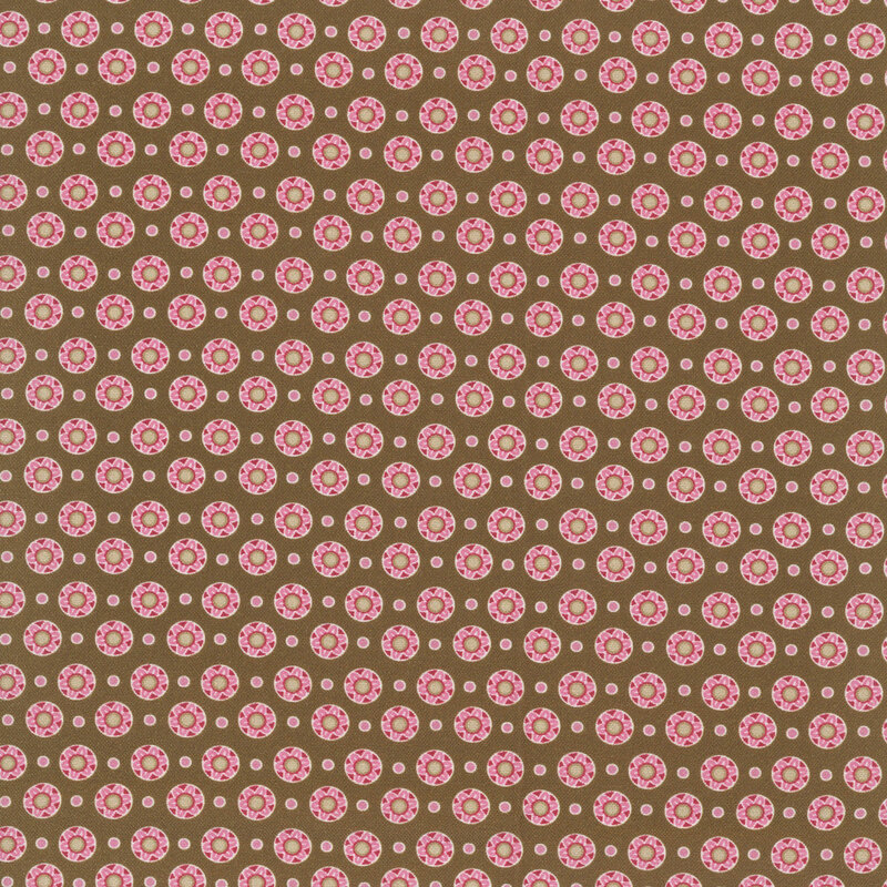 Brown fabric featuring evenly spaced floral medallions and pink circles.