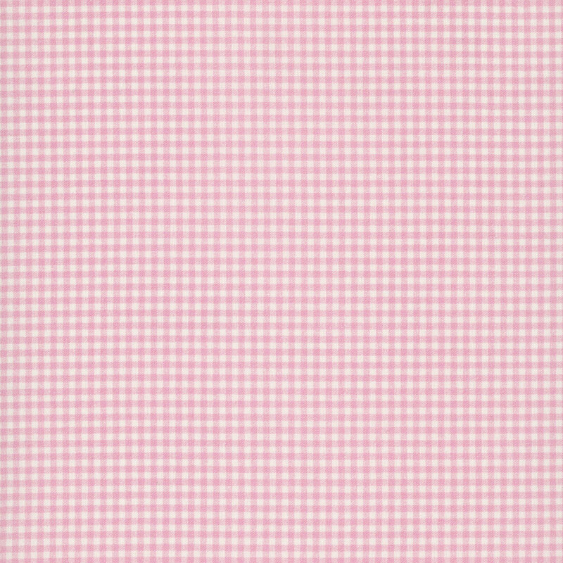 Pastel pink gingham on white fabric.