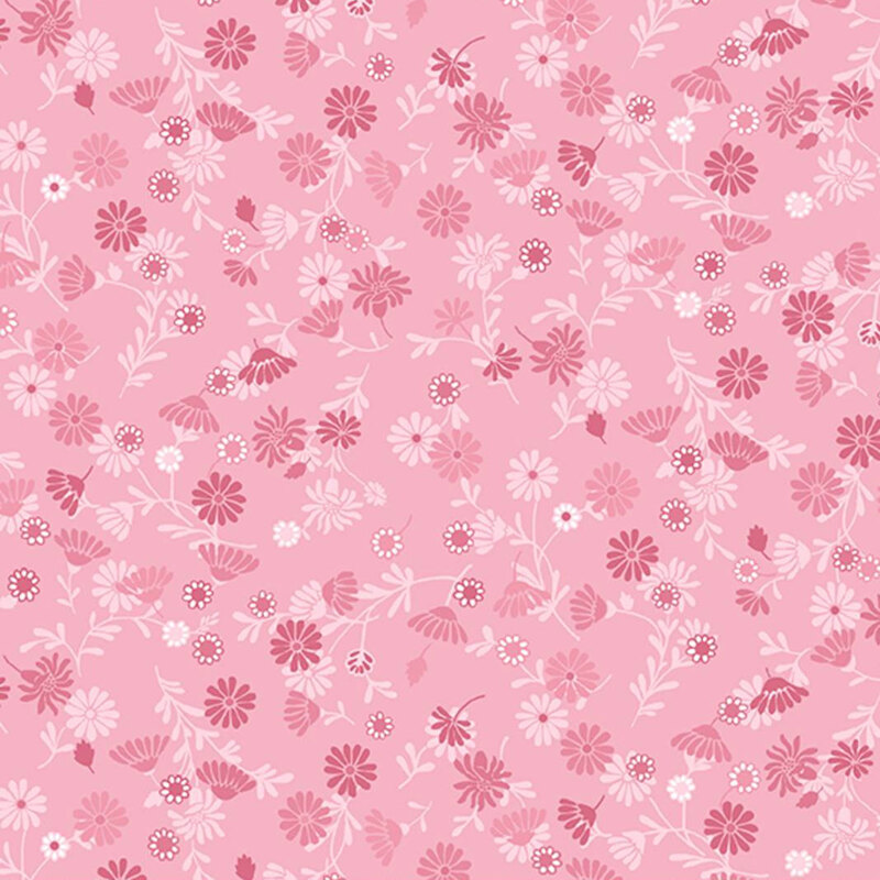 Pink fabric featuring delicate tonal flowers.