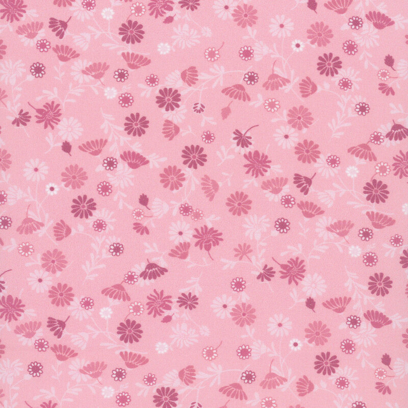 light pink fabric featuring delicate tonal flowers.