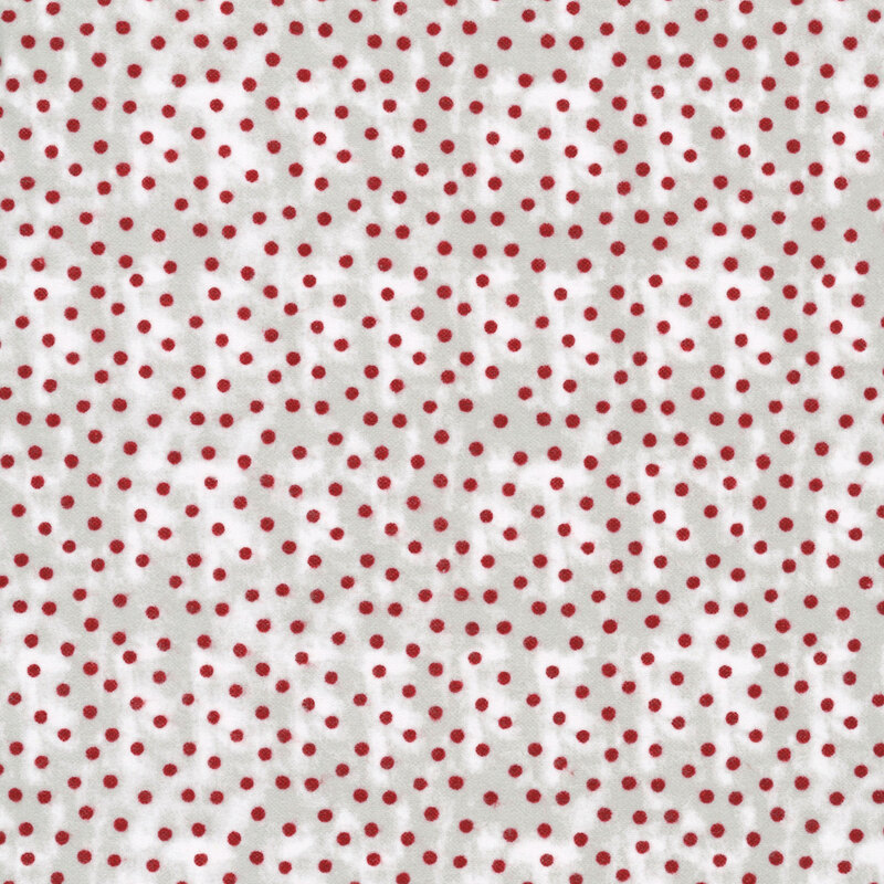 Mottled gray flannel fabric with a red polka dot pattern.