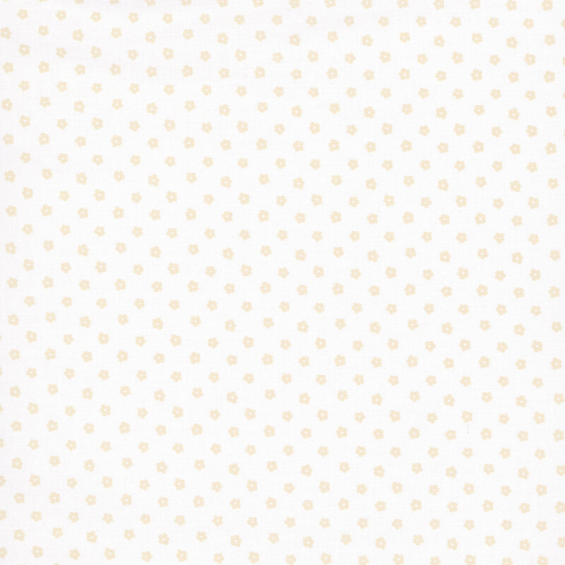 Off-white fabric with beige flower-shaped polka dots