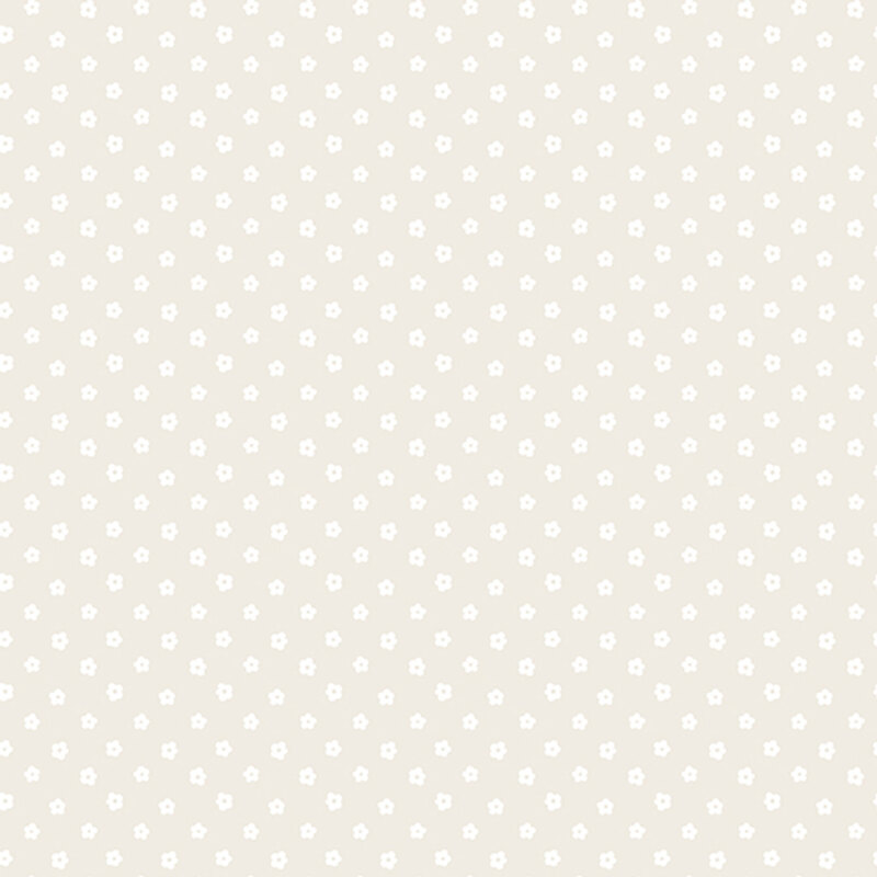 Light taupe fabric with cream flower-shaped polka dots