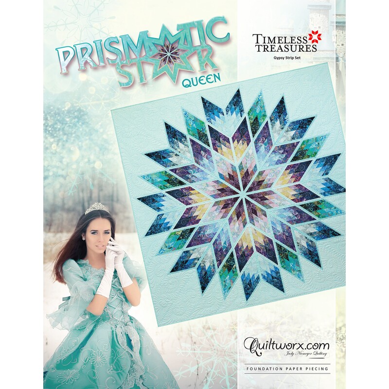 A woman in a teal dress stands beside a large, colorful quilt featuring a star pattern, titled Prismatic Star.