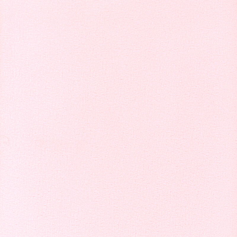 Solid pastel pink minky fabric.