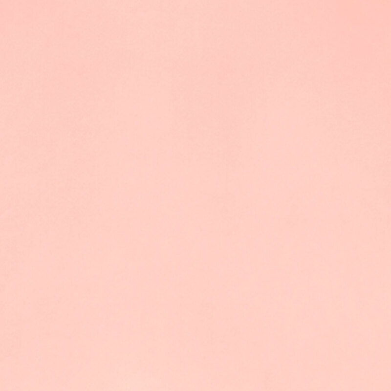 Solid pastel pink minky fabric.