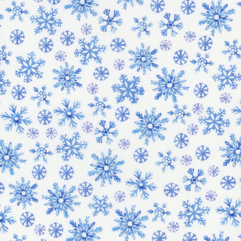 White fabric featuring mottled blue and purple snowflakes.