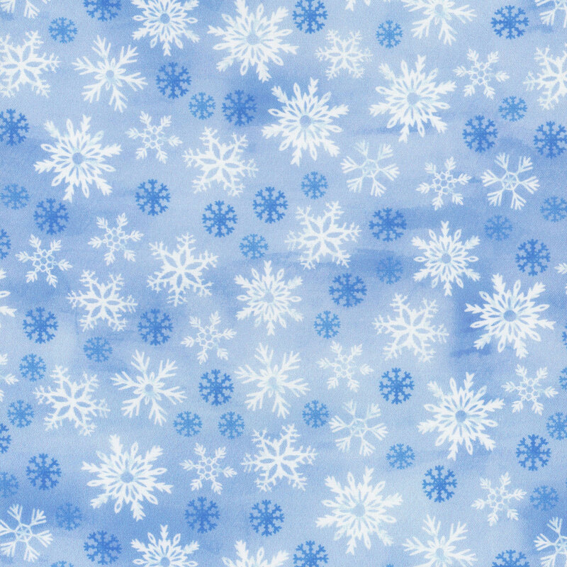Mottled blue fabric featuring dark blue and white snowflakes.