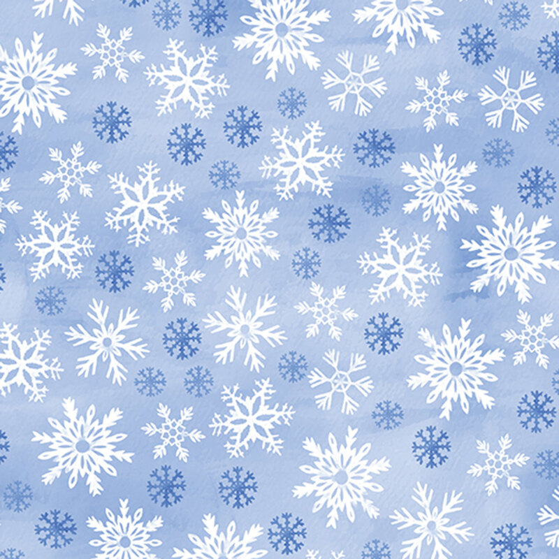 Mottled blue fabric featuring dark blue and white snowflakes.