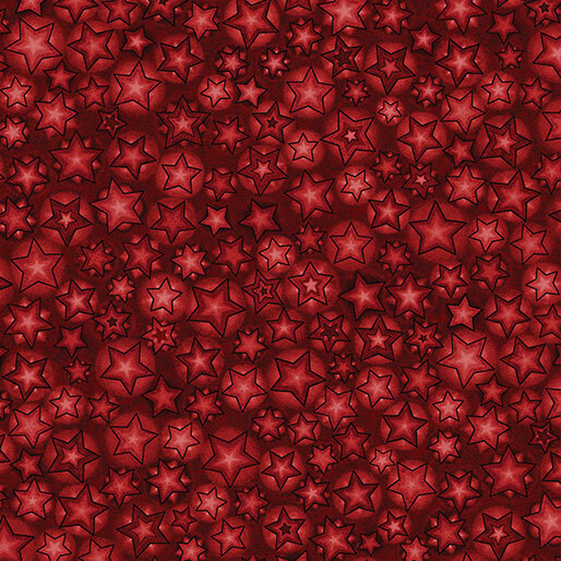 A mottled red fabric with a variety of red stars.