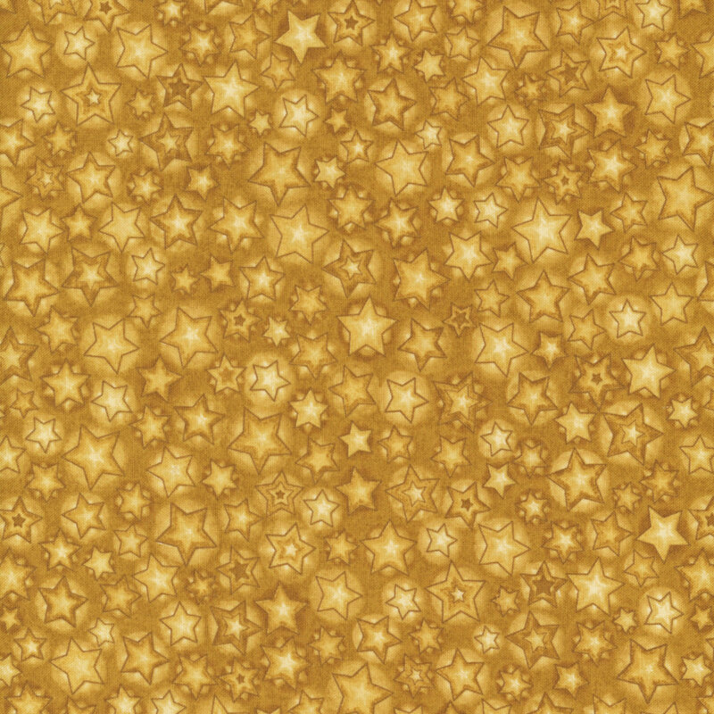 A mottled yellow fabric with a variety of yellow stars.