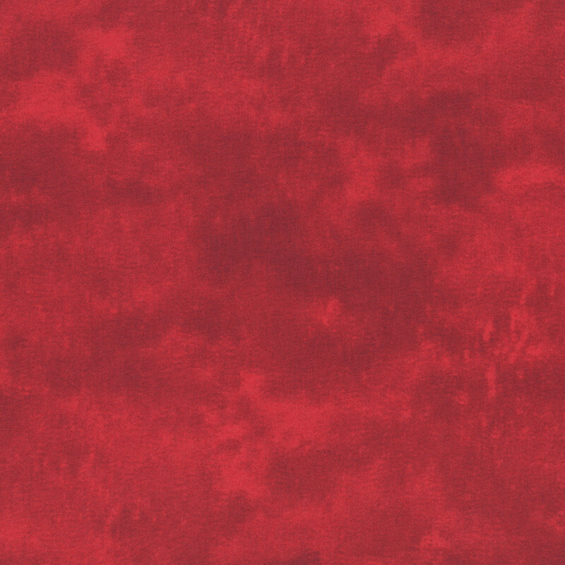 Mottled and textured deep red fabric.