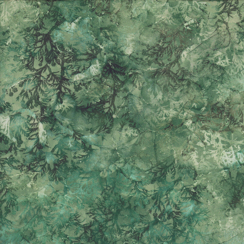 Mottled, watercolor pine green fabric featuring trees, leaves, and sprigs.