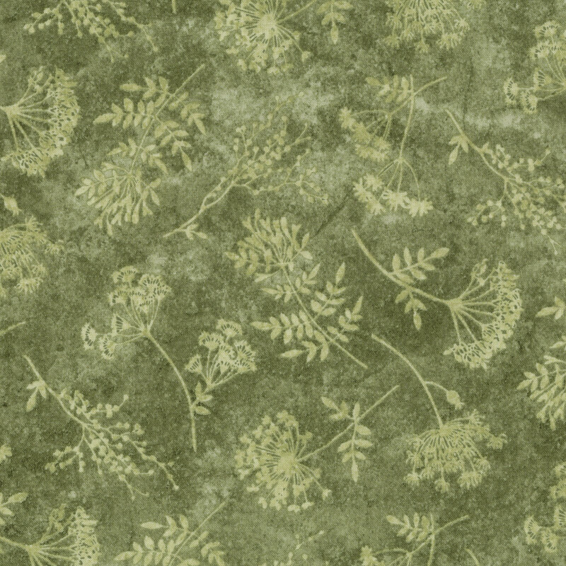 Mottled green fabric with a tonal, softly flattened floral and leaf pattern.