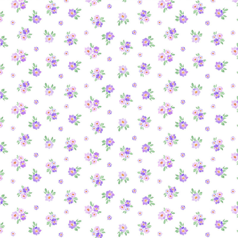 A white fabric with tossed purple flowers and green leaves in a watercolor style. 