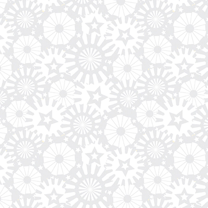 White on white fabric featuring stars and starbursts.