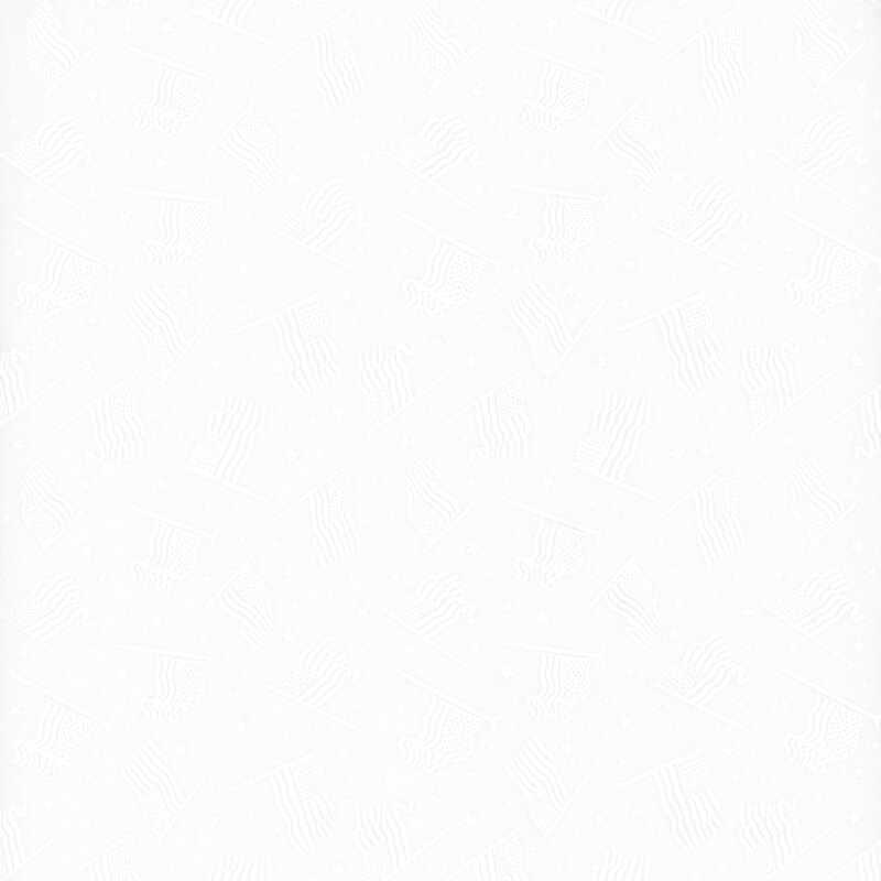 A white on white patriotic fabric with flags and stars.