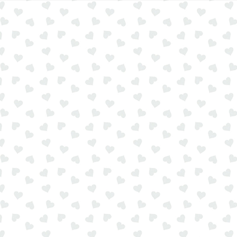 White on white fabric tossed with hearts.