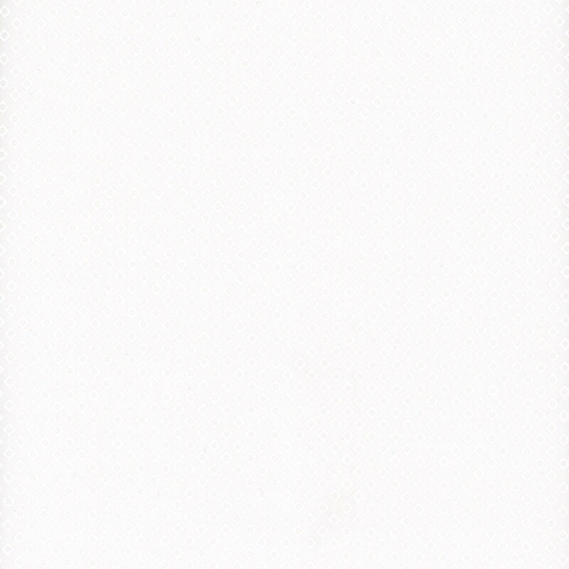 A white on white fabric featuring small geometric diamond outlines.