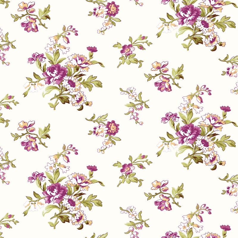 Cream fabric with ornamental bunches of magenta and pastel yellow florals with light green leaves