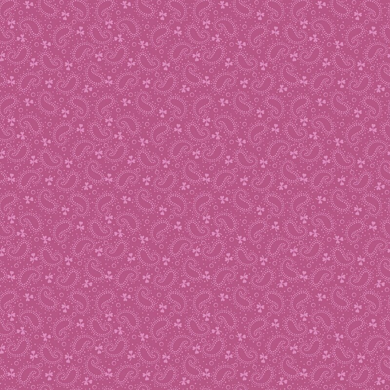 Raspberry pink fabric with a light mauve, dotted boteh and leaf pattern