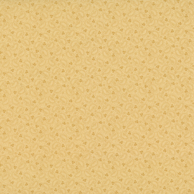 Goldenrod fabric with a gold, dotted boteh and leaf pattern