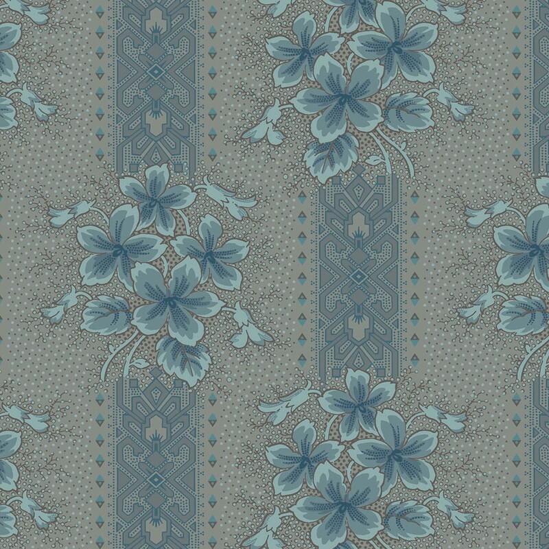 Slate gray fabric with a tonal dotted texture, blue and gray ornamental stripes, and light teal floral clusters 