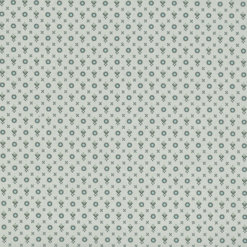 cool gray fabric with a primitive pattern of dark gray and ice blue circles, diamonds, lines, and dots