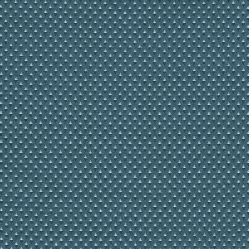 Teal fabric with indigo and light blue diamond shapes with light circles