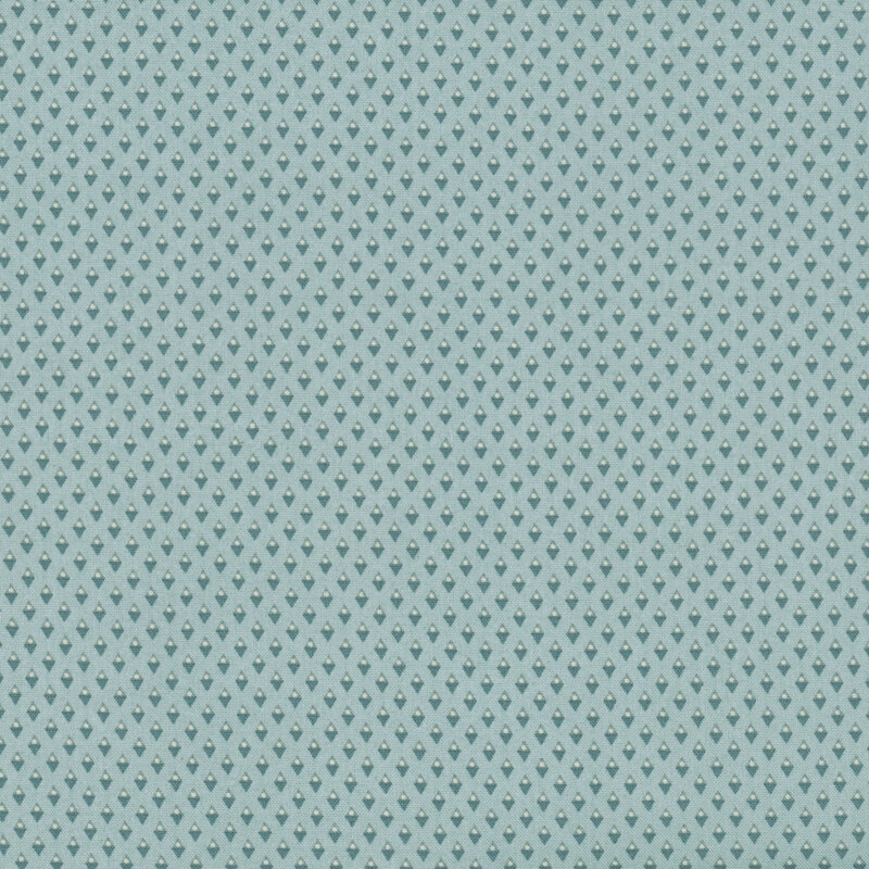 Cadet blue fabric with teal and gray diamond shapes with light circles