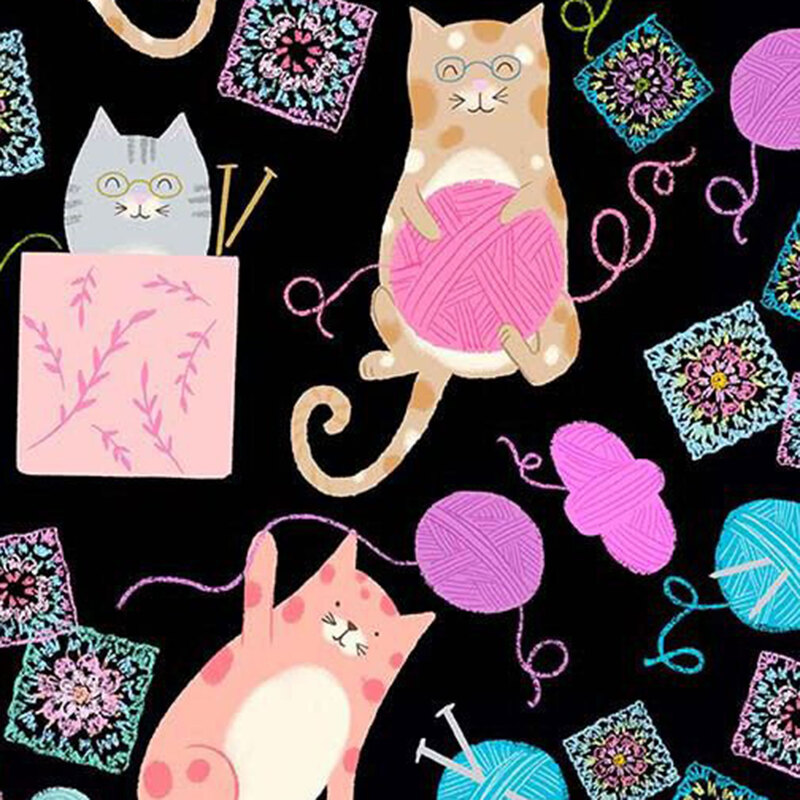 Black fabric featuring playful cats enjoying balls of yarn and granny squares.