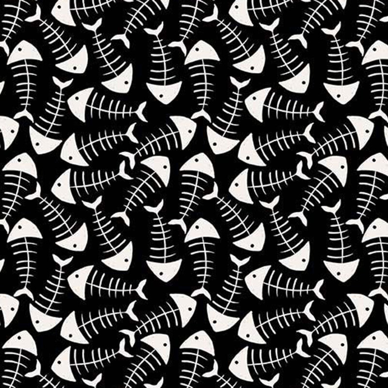Black fabric covered in white cartoon-style fish bones.