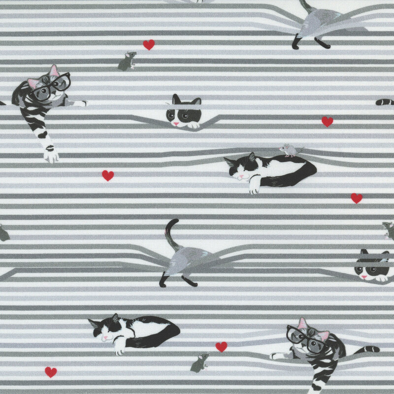 White fabric featuring playful cats getting caught within window blinds and scattered red hearts.