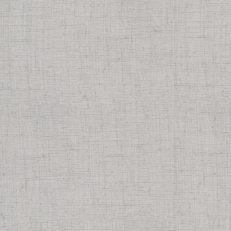 Gray fabric with a woven texture.